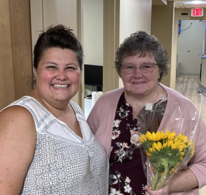 (L) Mt. Abram Practice Manager, Amanda Smith, with (R) Strong Area Health & Dental Center's Practice Manager, Priscilla Bartlett, who visited to celebrate and support the community.
